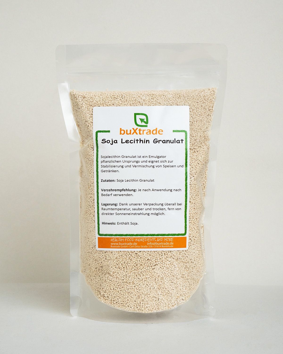 Verpackung mit buXtrade Soja Lecithin Granulat, hellgelbe Kügelchen.