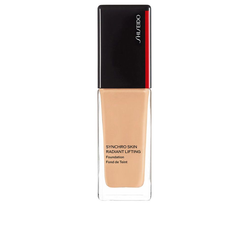 Flakon Shiseido Synchro Skin Radiant Lifting Foundation. Rechteckige Form, transparente Basis, schwarzer Deckel mit rotem Akzent. Text.