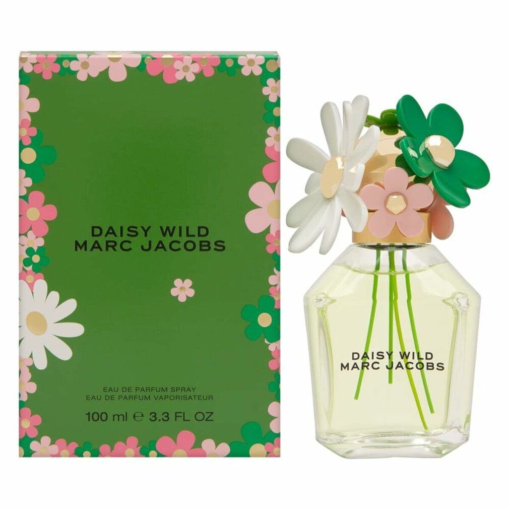 Parfümflakon mit Blumenaufsatz und Verpackung. Flakon mit grünlicher Flüssigkeit. Verpackung grün mit Blumenmuster. Schriftzug: Daisy Wild Marc Jacobs.