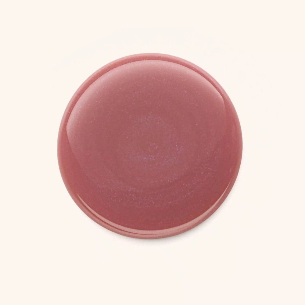 Runder Klecks Nagellack in Rosa. Glänzende Oberfläche.