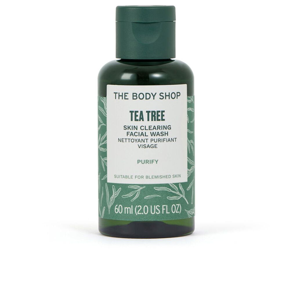 Grüne Flasche mit Klappdeckel. Aufschrift: The Body Shop, Tea Tree, Skin Clearing Facial Wash, 60 ml. Für unreine Haut.