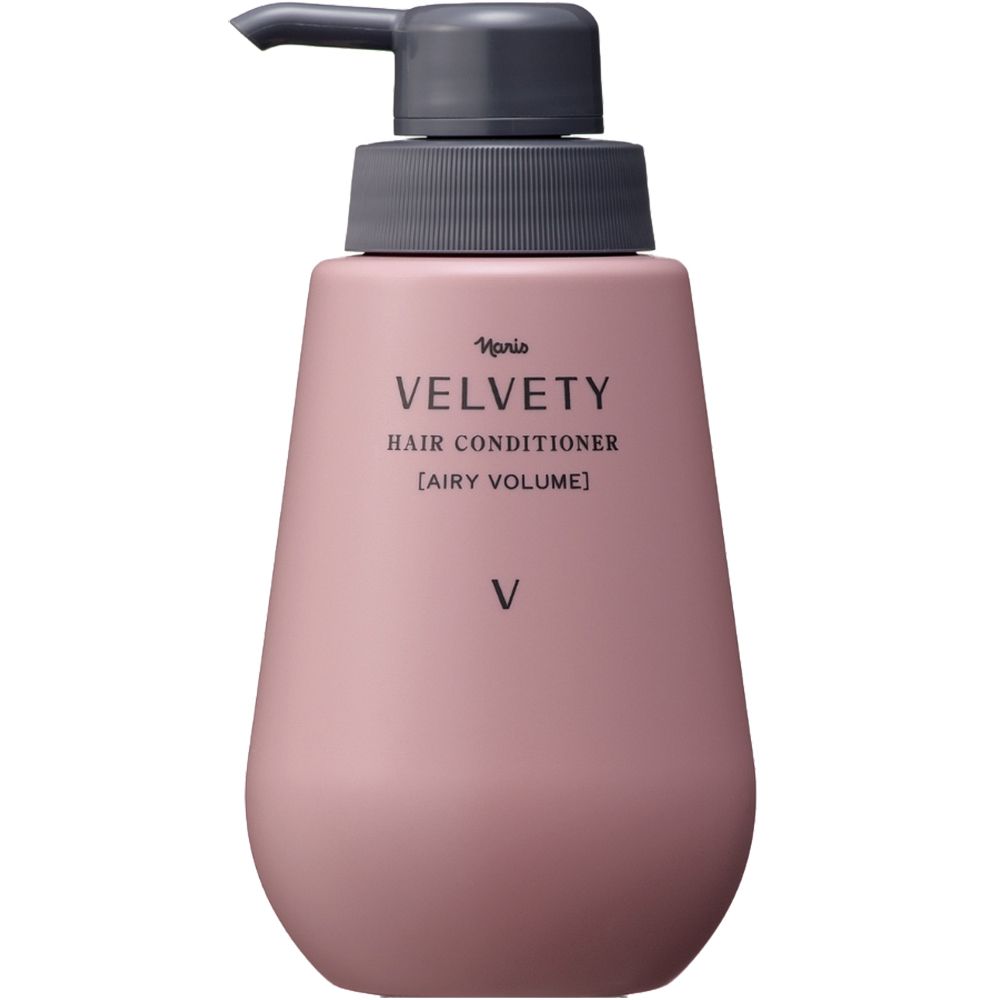 Rosa Flasche mit Pumpe. Aufschrift: VELVETY HAIR CONDITIONER [AIRY VOLUME].