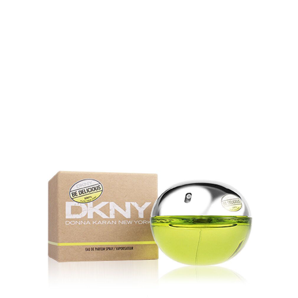 Runder Flakon und Verpackung. Flakon mit silberner Kappe und gelb-grüner Flüssigkeit. Verpackung mit Logo DKNY Be Delicious.