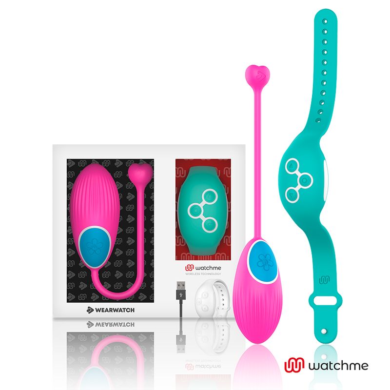 Pinkes Vibro-Ei mit Herzspitze und Armband, USB-Kabel und Ladeeinheit in Verpackung.