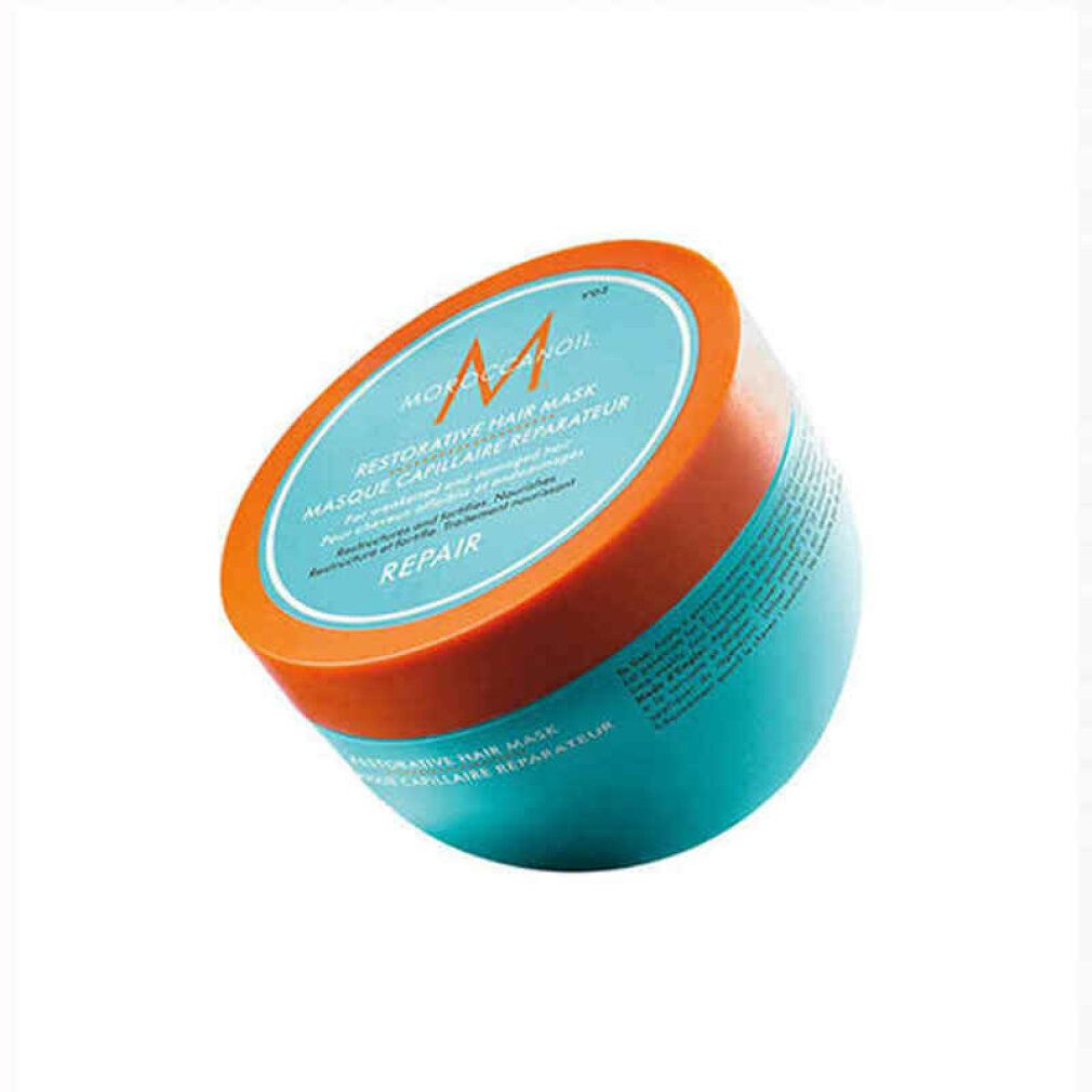 Türkisfarbene Dose mit orangefarbenem Deckel. Text: Moroccanoil, Restorative Hair Mask, Repair. Schräge Ansicht.