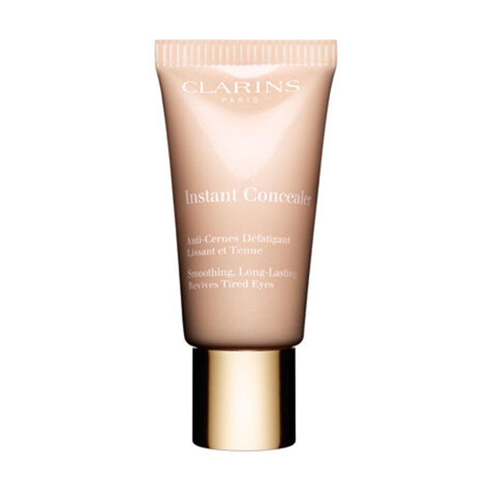 Clarins Instant Concealer Tube. Beige-gelbe Farbnuance. Text auf dem Tube: Instant Concealer, Anti-Cernes Défatigant, Lissant et Tenu.