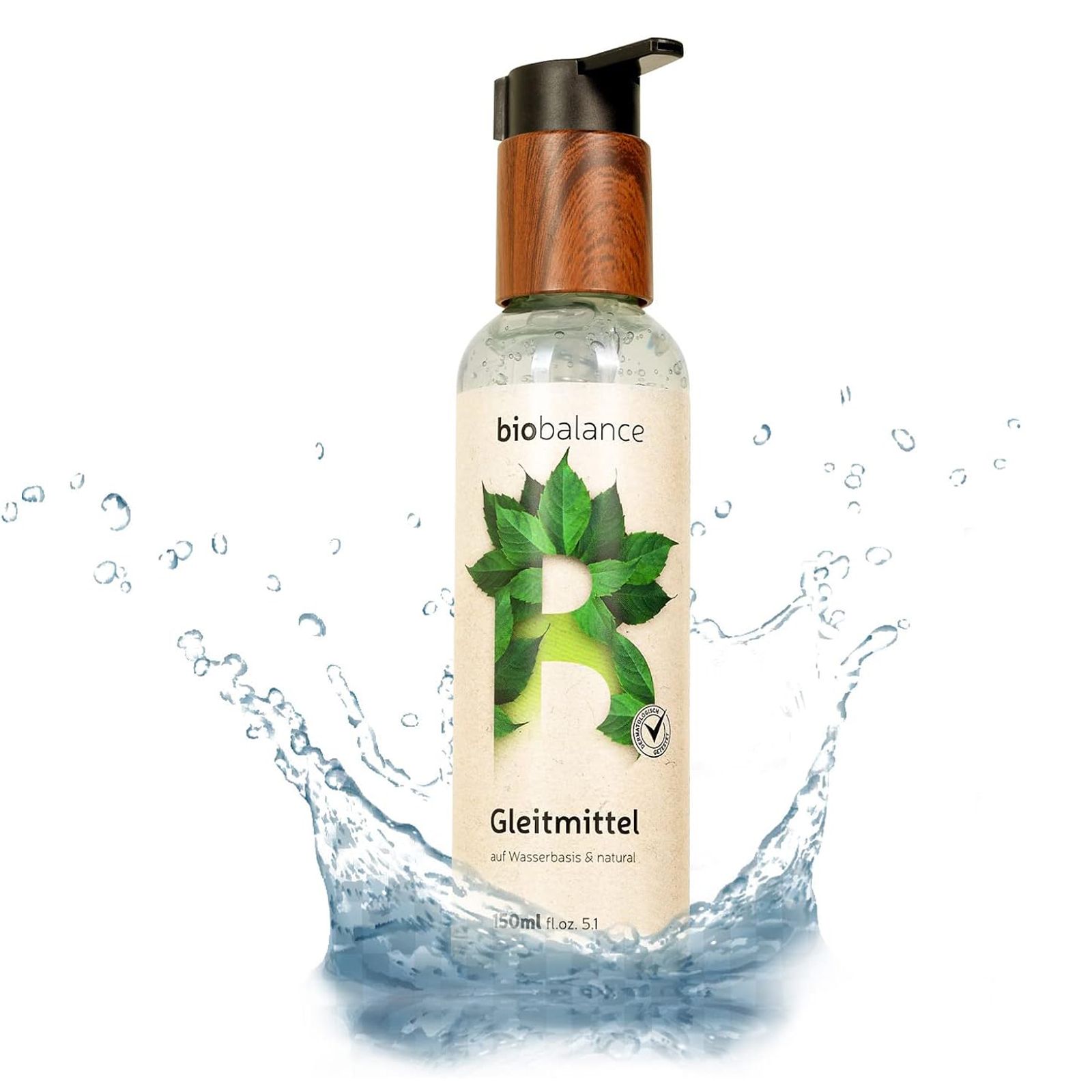 Flasche mit Pumpe, Holzoptik, „biobalance“ und „Gleitmittel“. Wasser spritzt.