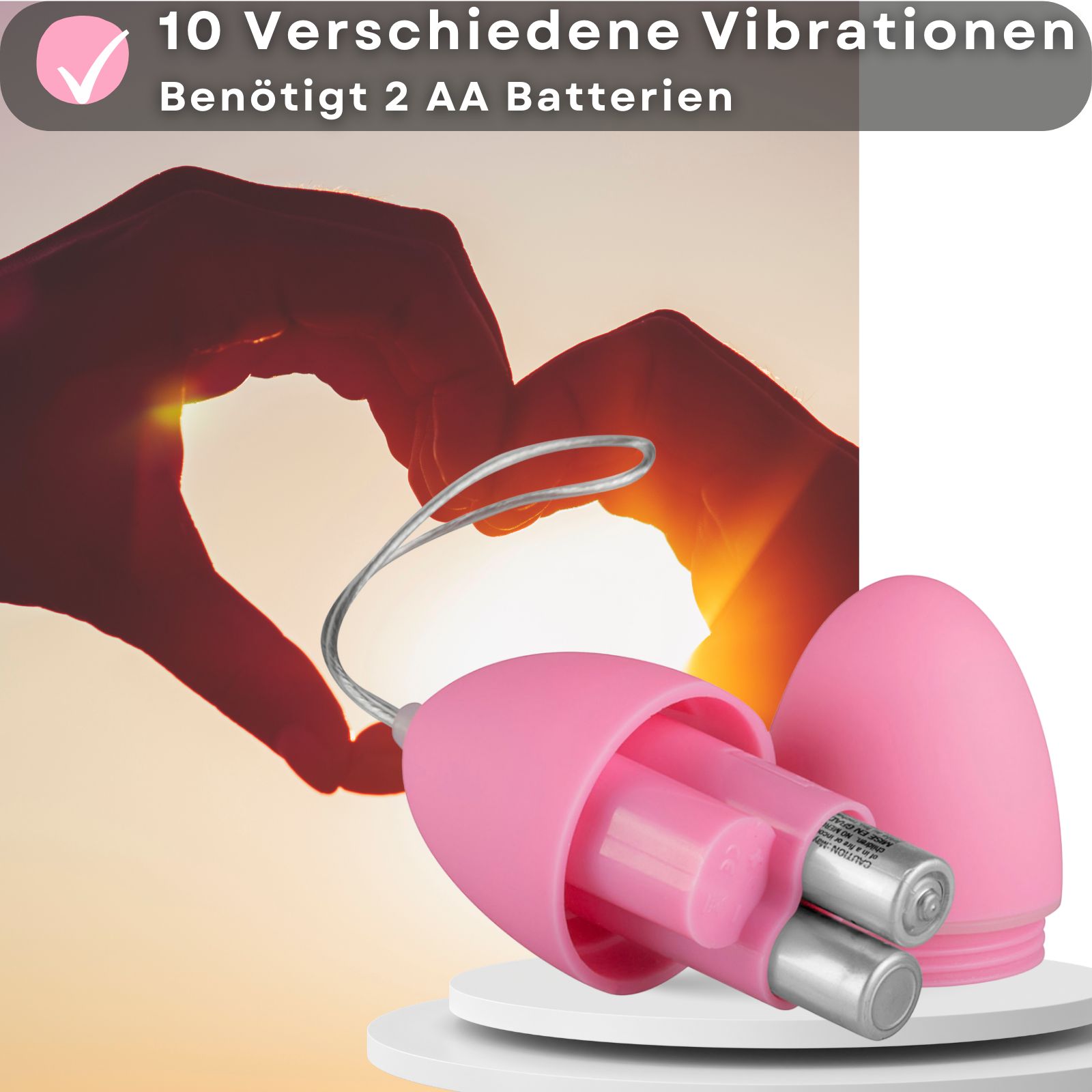 Rosa Ei-Vibrator mit geöffnetem Gehäuse. Zwei Batterien sind sichtbar. Text: 10 Vibrationen, 2 AA Batterien.
