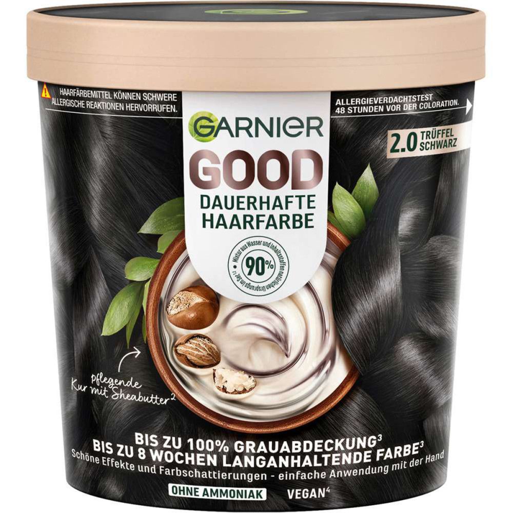 Garnier Good, dauerhafte Haarfarbe in einem runden Behälter. Schwarze Haarsträhne, Shea Butter, Text: 2.0 Trüffel Schwarz.