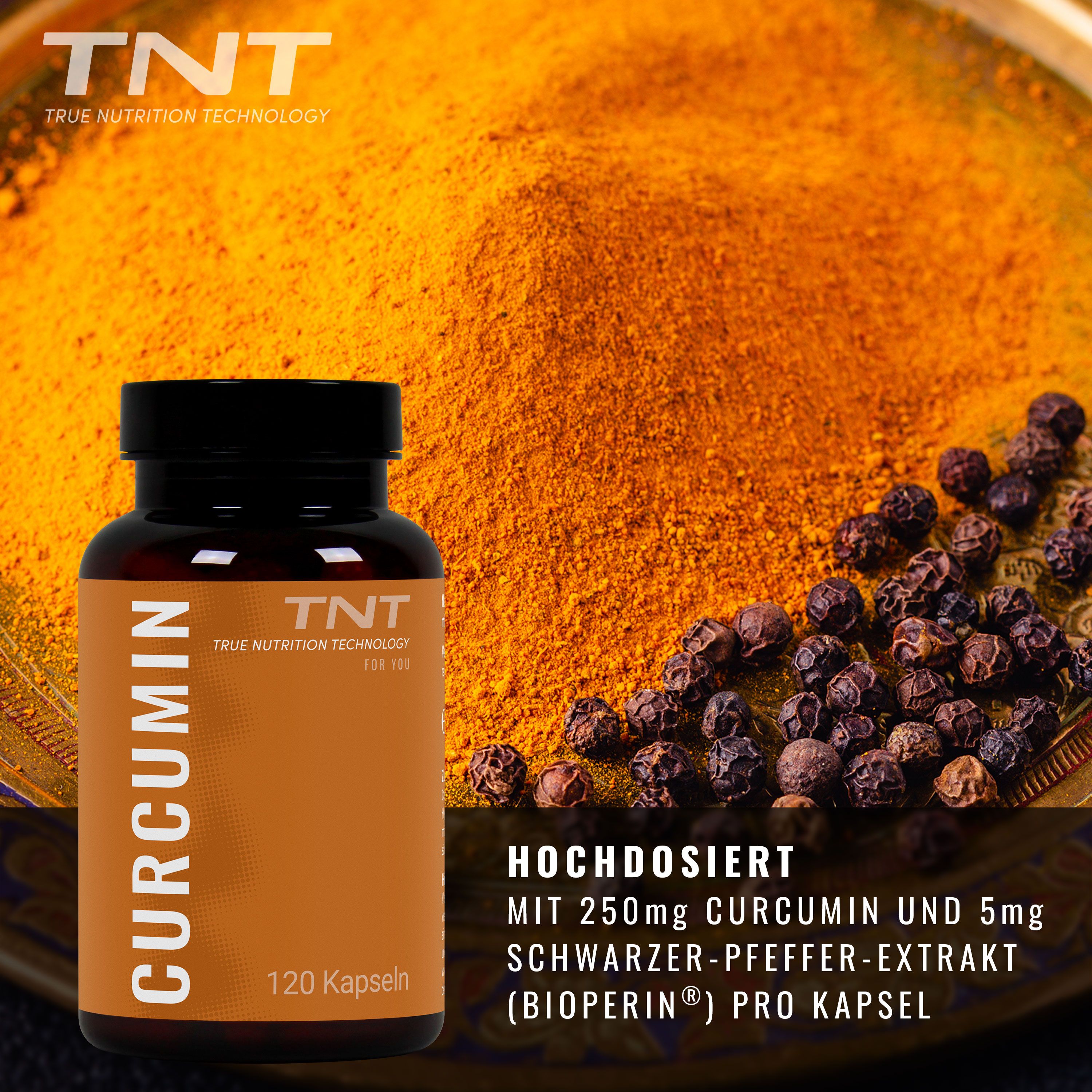 Kapsel-Dose vor Kurkuma-Pulver und Pfefferkörnern. Texte: Hochdosiert mit 250mg Curcumin und 5mg Schwarzer-Pfeffer-Extrakt (Bioperin®) pro Kapsel.