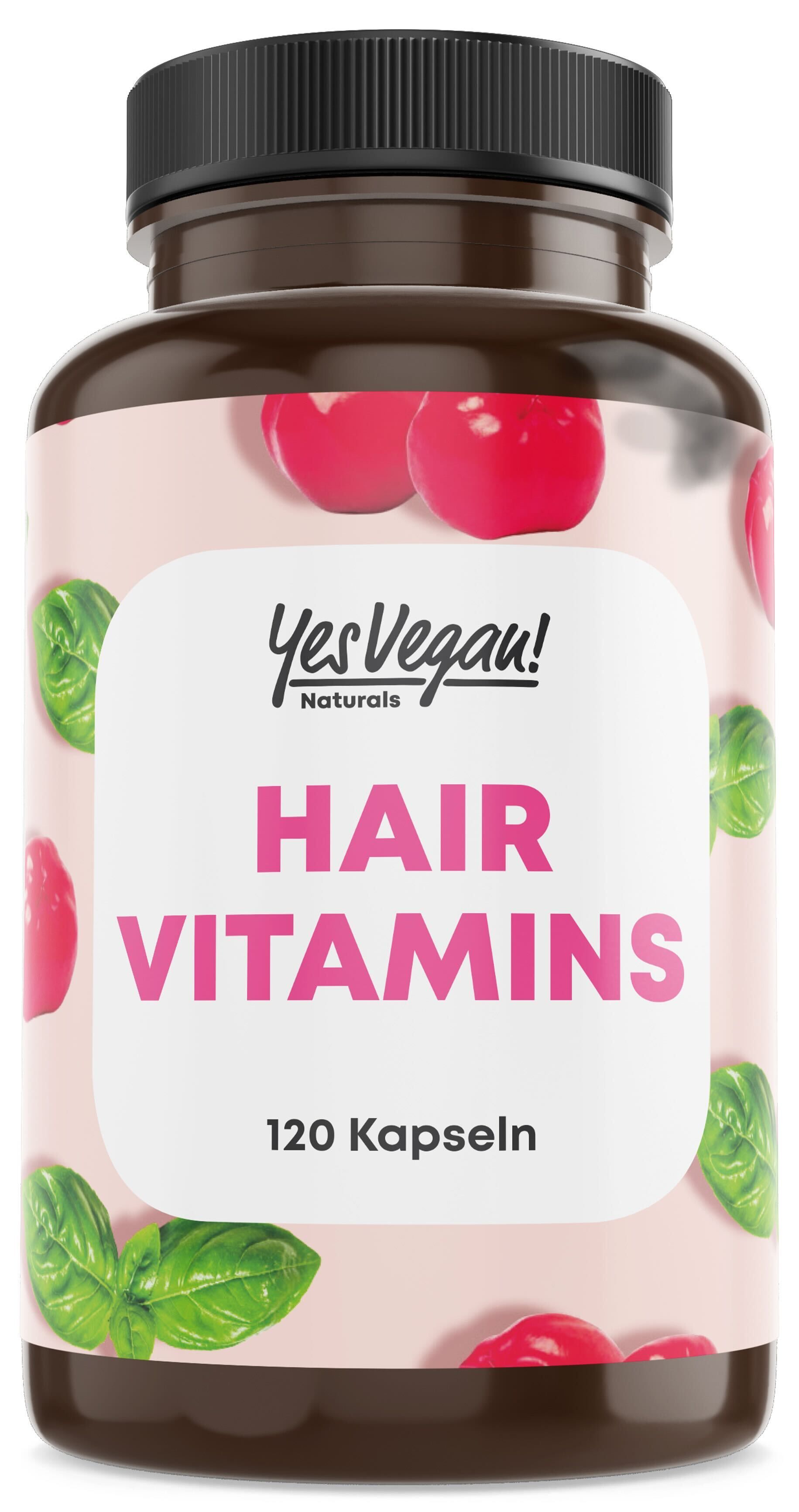 Braune Flasche mit Hair Vitamins, 120 Kapseln. Logo YesVegan! Naturals. Rosa Hintergrund mit roten Früchten und grünen Blättern.