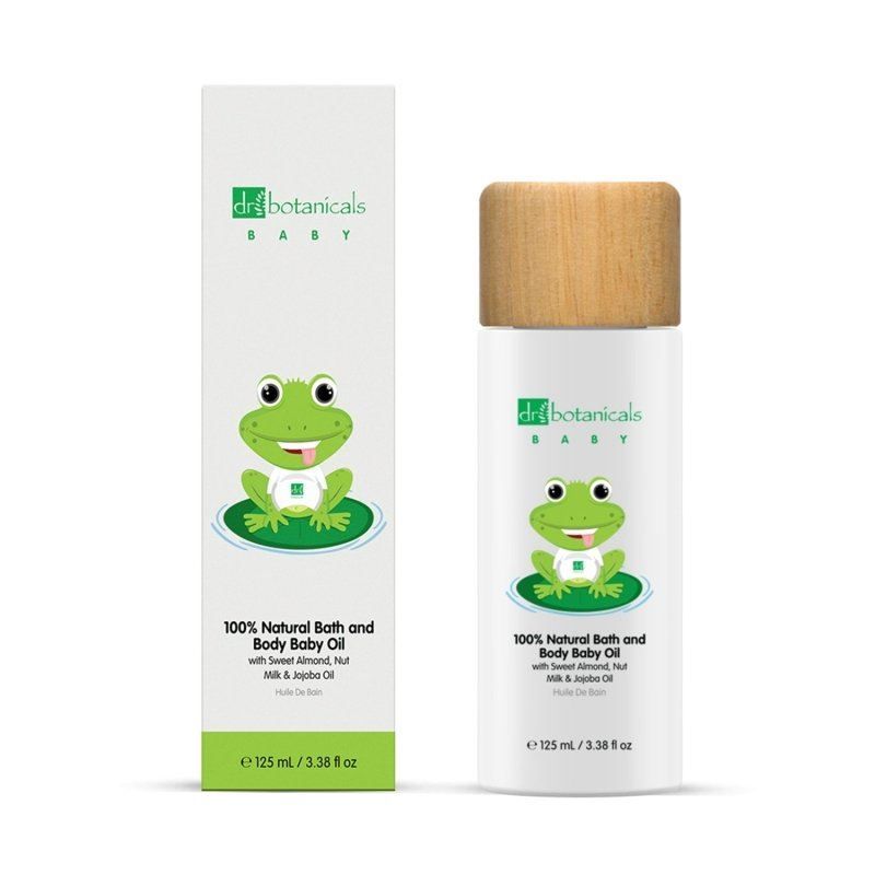Dr. Botanicals Babyöl Flasche und Karton mit Frosch-Illustration.