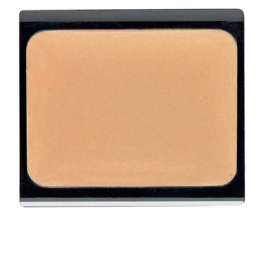 Kompakte, beige-apricotfarbene Camouflage-Creme in einer rechteckigen, schwarzen Kompaktverpackung.