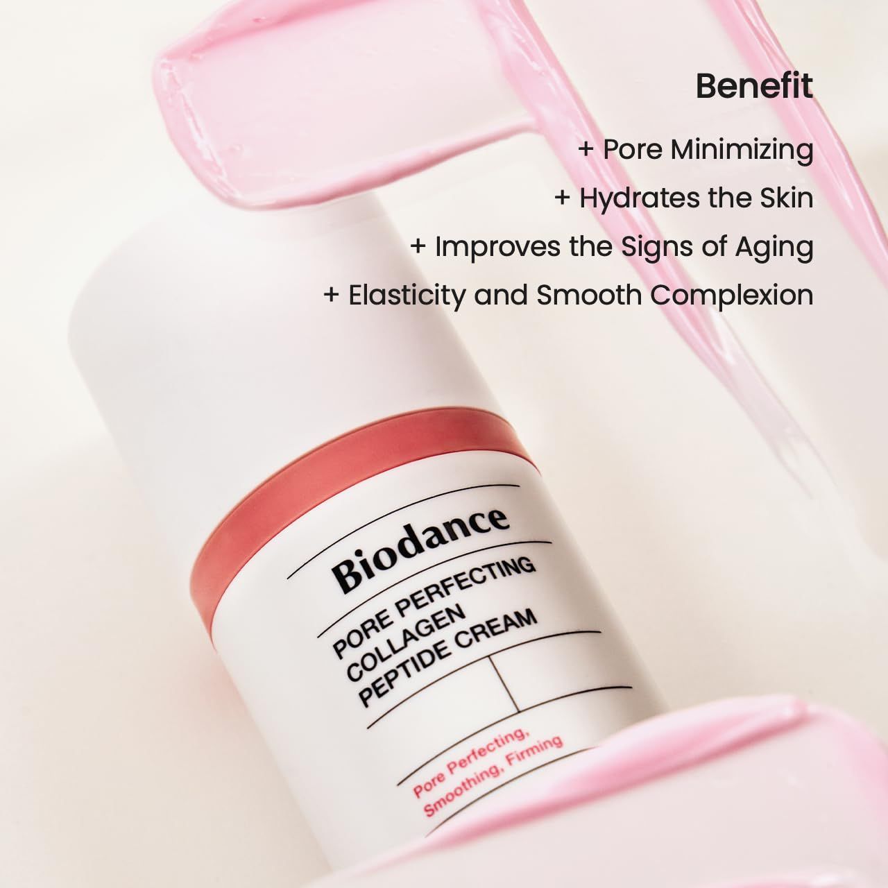 Weißer Tiegel mit rosa Akzenten. Aufschrift: Biodance Pore Perfecting Collagen Peptide Cream. Rosa Creme-Schlieren.