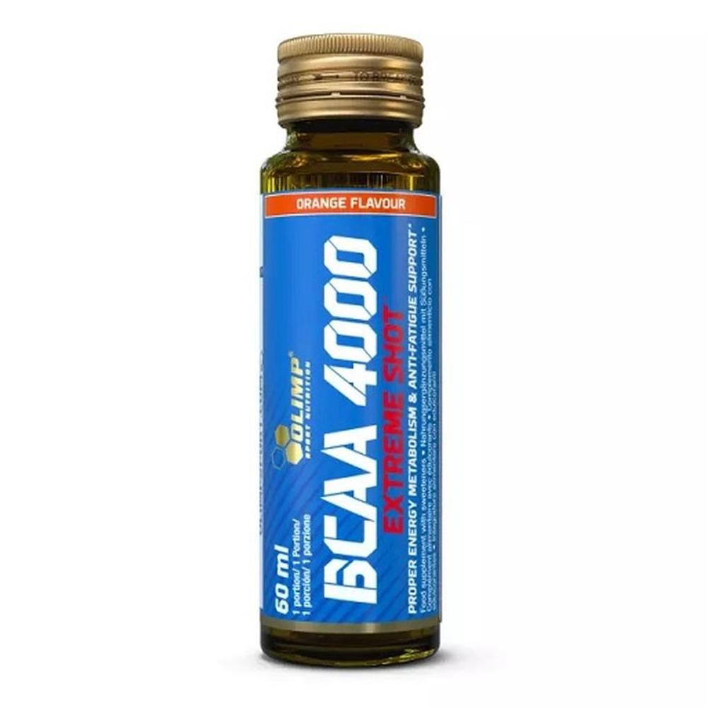 Braune Flasche mit blauem Etikett. Aufschrift: BCAA 4000 Extreme Shot, Orange Flavour. Goldener Schraubverschluss.