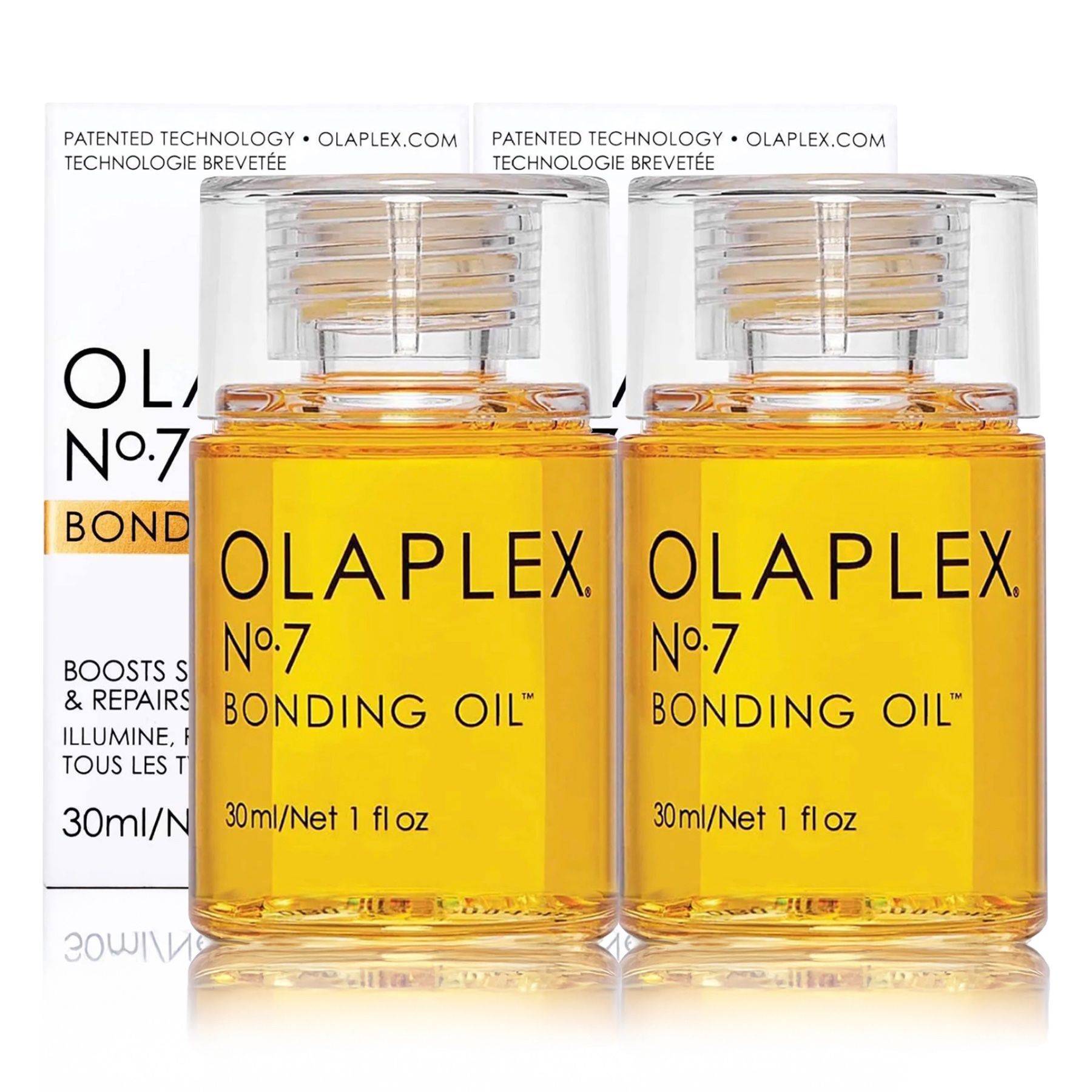 Zwei Flaschen Olaplex Nr. 7 Bonding Oil. Gelbes Öl. Text: Boosts Shine & Repairs.