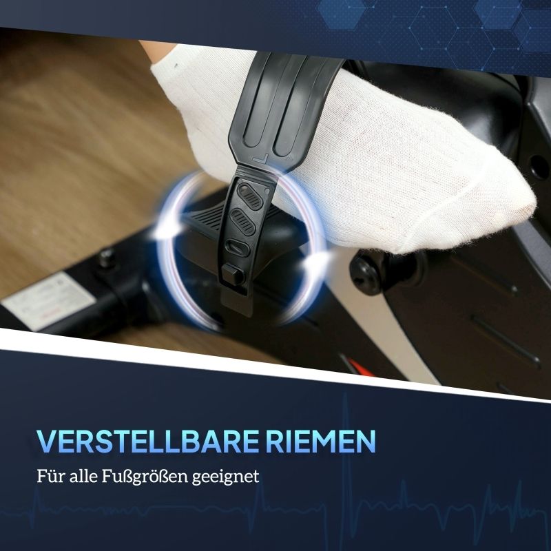 Nahaufnahme eines Fußes auf einem Pedal mit verstellbaren Riemen. Text: VERSTELLBARE RIEMEN. Für alle Fußgrößen geeignet.