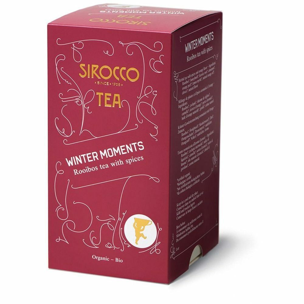 Rote Kartonverpackung mit Aufschrift "Sirocco Tea Winter Moments". Enthält Rooibos-Tee mit Gewürzen. Bio-Zertifizierung.