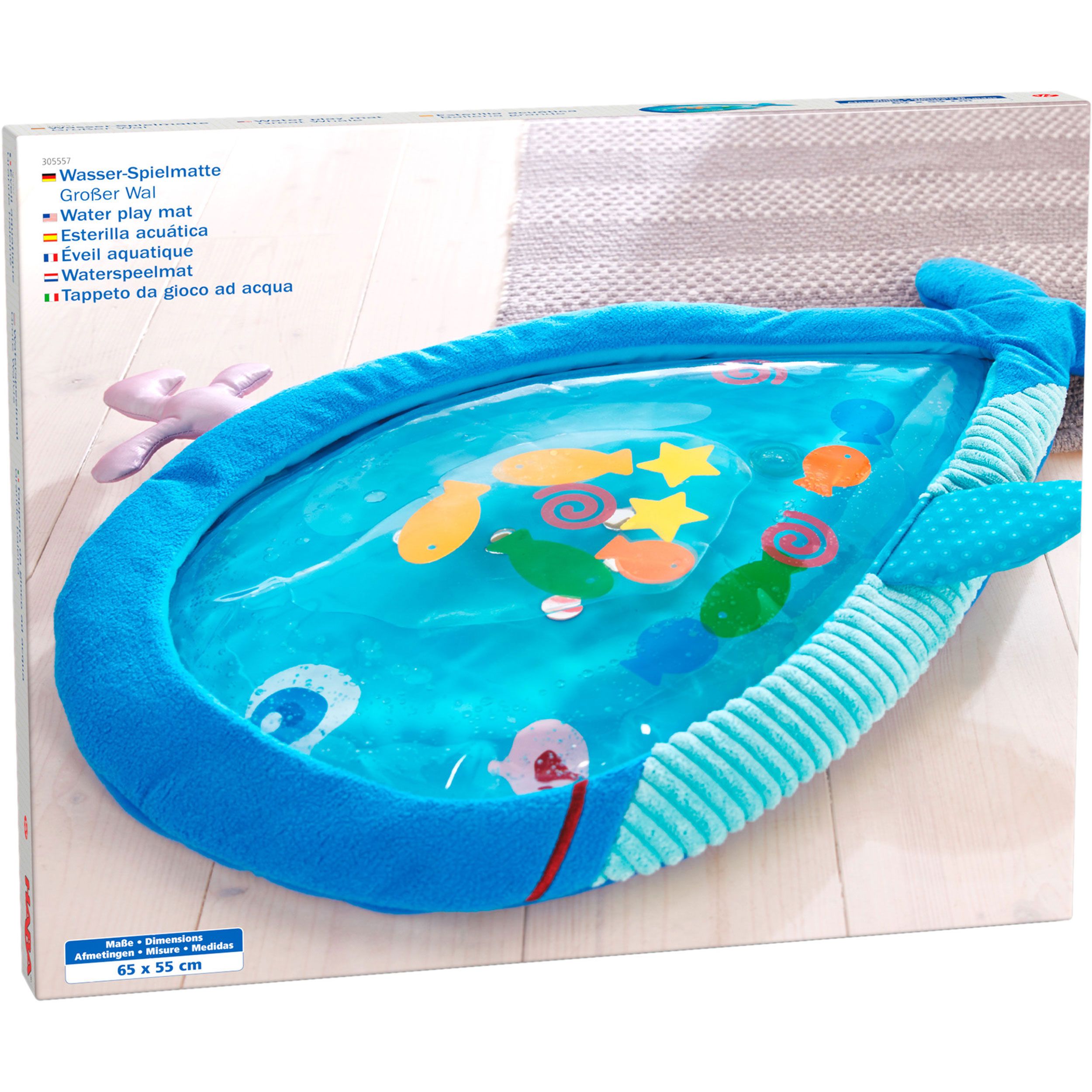 Verpackung der Wal-Spielmatte. Enthält Produktabbildung und Text in mehreren Sprachen. Abmessungen: 65x55 cm.