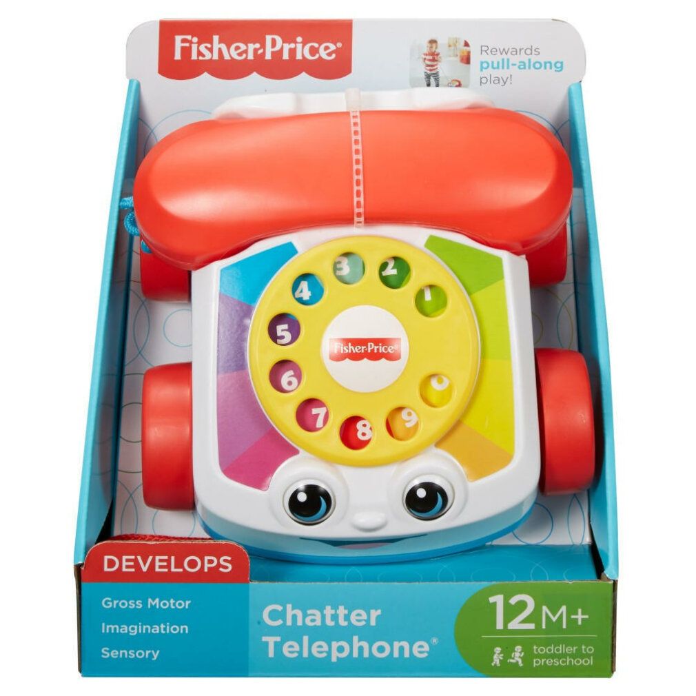 Verpackung eines Spielzeug-Telefons. Das Telefon hat rote Räder, einen roten Hörer und eine gelbe Wählscheibe. Das Logo Fisher-Price ist sichtbar.