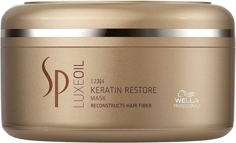 Goldfarbene Dose mit SP Luxeoil Keratin Restore Mask. Aufschrift: 123/4, Maske, Reconstructs Hair Fiber, Wella Professionals.