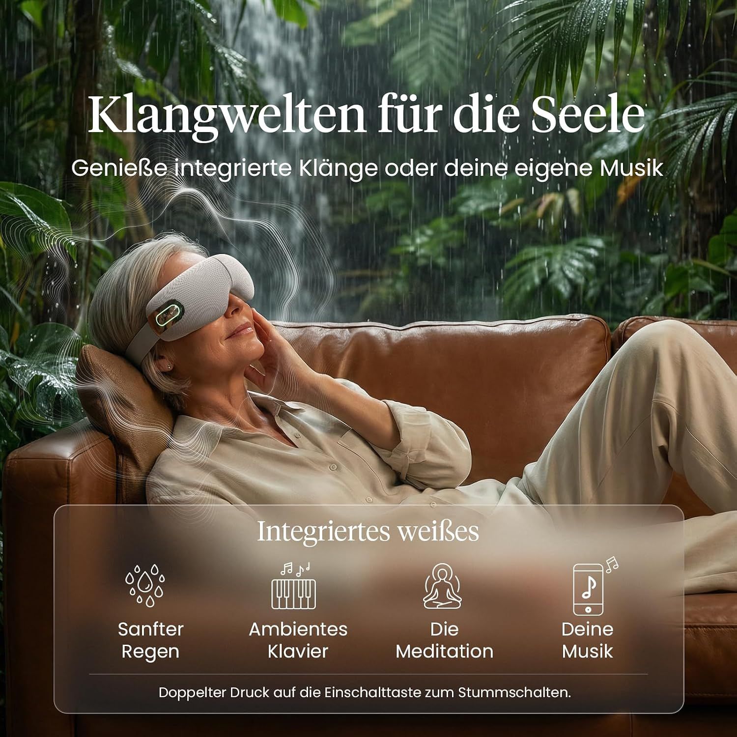 Graue Augenmaske mit Heizfunktion und Luftdruckmassage, auf einem Mann mit geschlossenen Augen liegend.