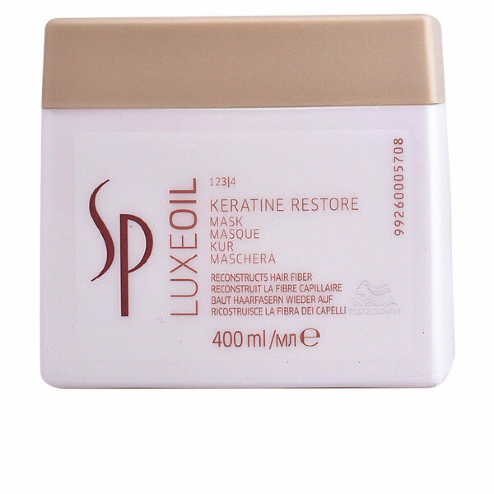 Weißer Tiegel mit goldfarbenem Deckel. Aufschrift: SP Luxeoil Keratin Restore Mask. 400 ml.
