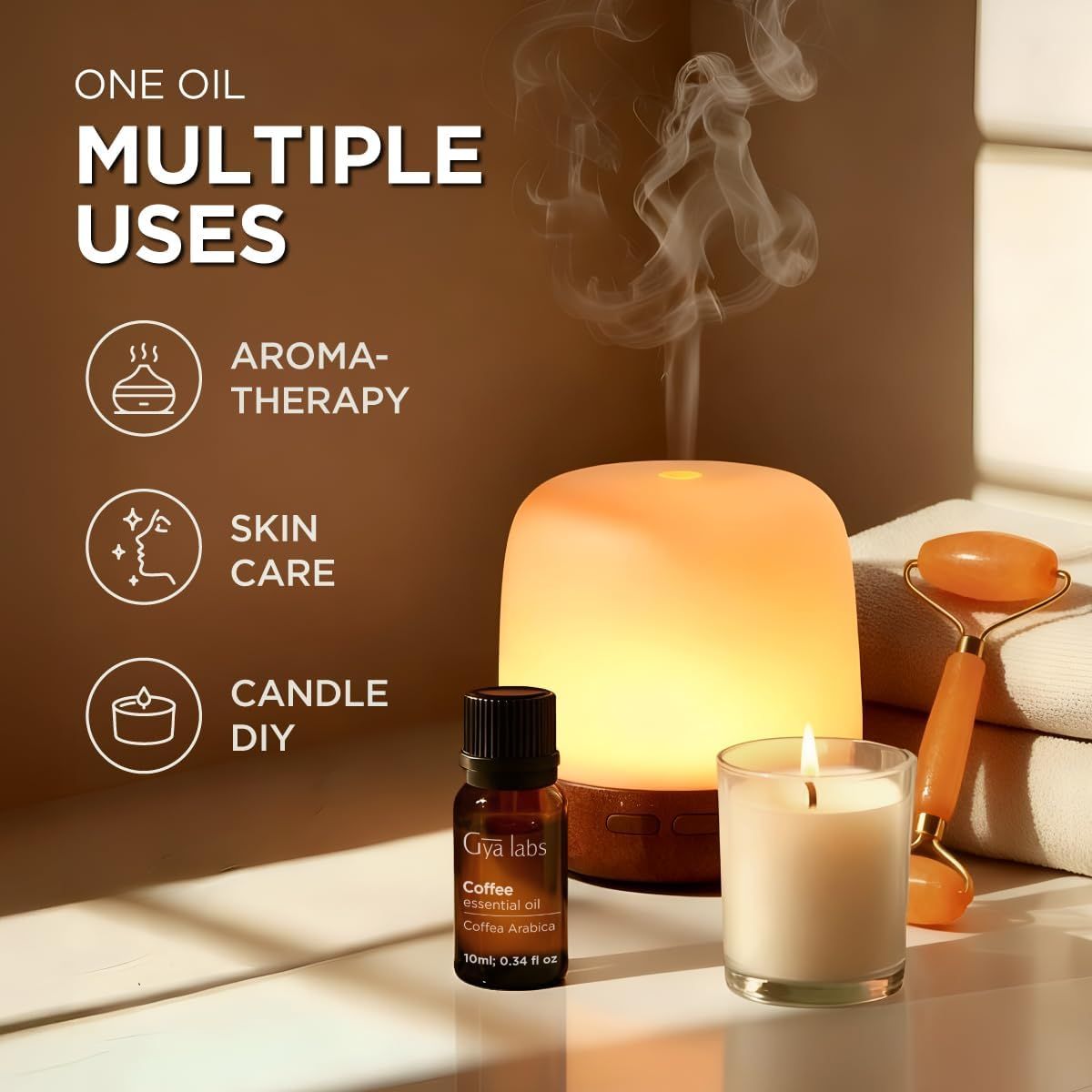 Diffusor, Ölflasche, Kerze, und Gesichtsmassage-Roller. Text: Eine Öl, mehrere Anwendungen: Aromatherapie, Hautpflege, Kerzen-DIY. Gya Labs.