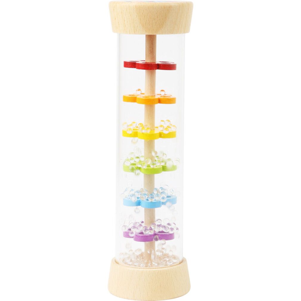 Zylindrisches Holzspielzeug mit farbigen Blütenblättern in einem transparenten Zylinder. Kleine Kugeln sind unten sichtbar.