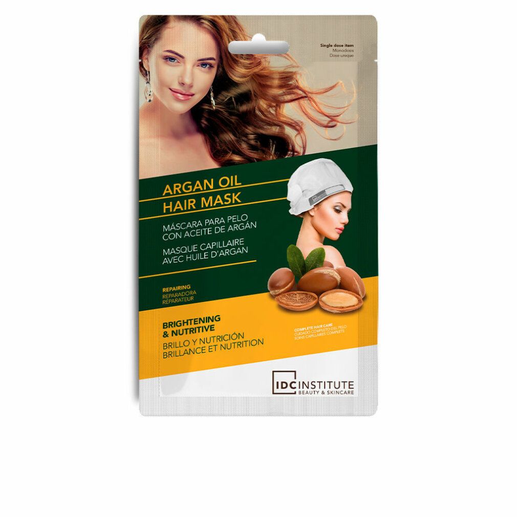Haarmaskenverpackung mit Frau, Arganöl-Illustrationen und Text. Marke: IDC Institute.