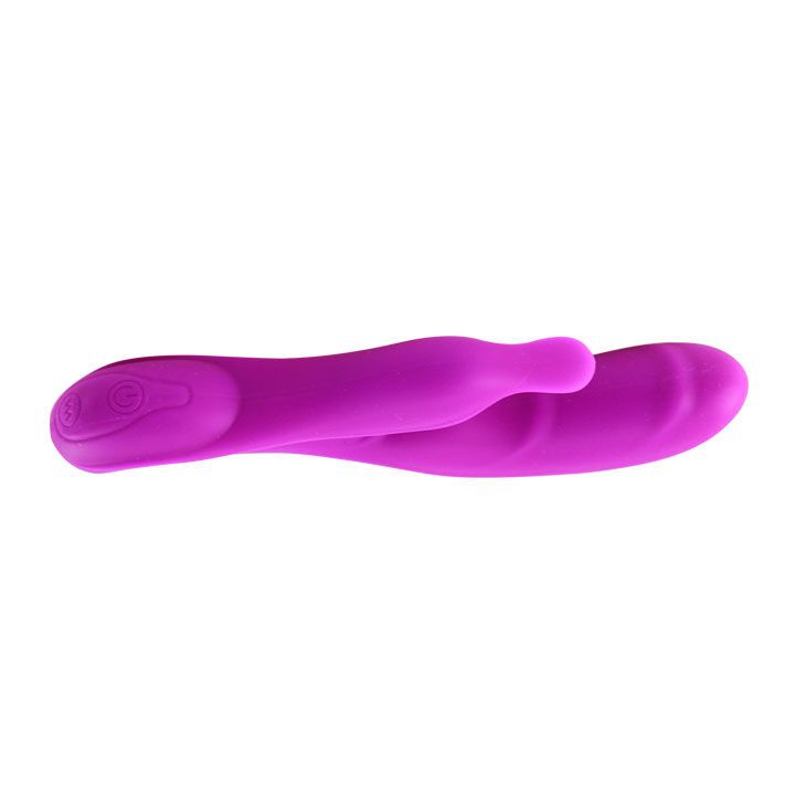 Lila Massager mit abgerundeten Enden. Mit Bedienknopf.