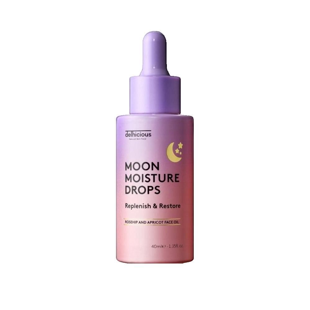 Flasche mit Pipette. Aufschrift: Moon Moisture Drops. Farbverlauf von Rosa nach Lila. Mond- und Sternen-Symbol.