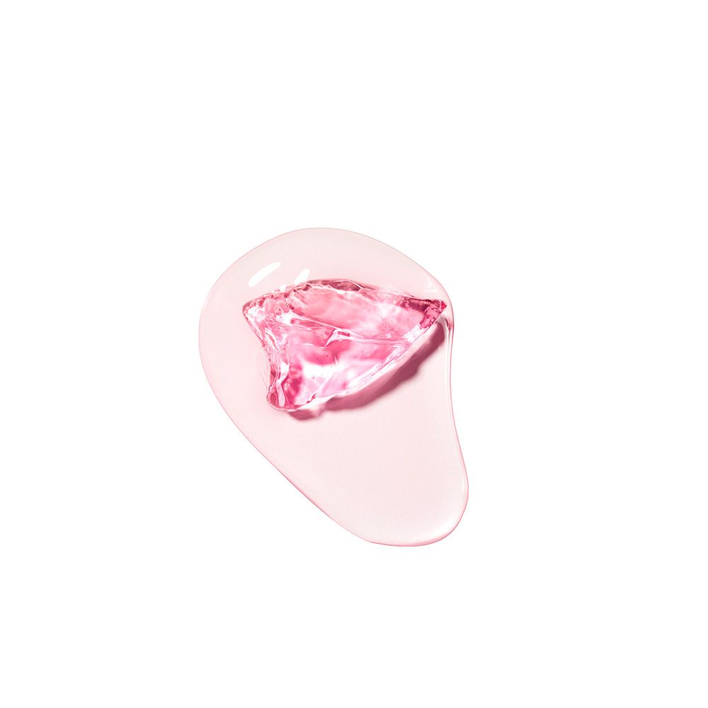 Eine rosa Gel-Textur mit einem facettierten, rosa Kristall in der Mitte.
