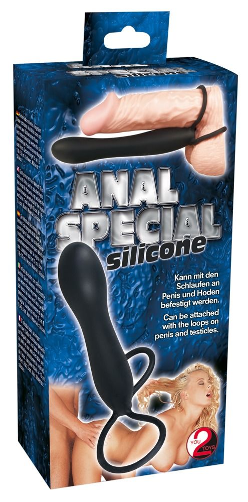 Schwarzer Silikon-Dildo mit Ring. Verpackung mit Produktname, Abbildung und Text. Marke: You2Toys.