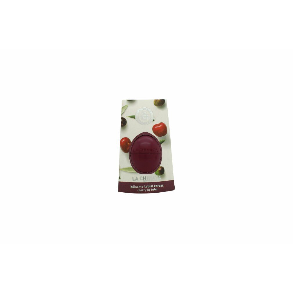 Kirschfarbener Lippenbalsam in Verpackung. Oliven und Kirschen auf der Verpackung. Text: La Chinata, Balsamo labial cereza.