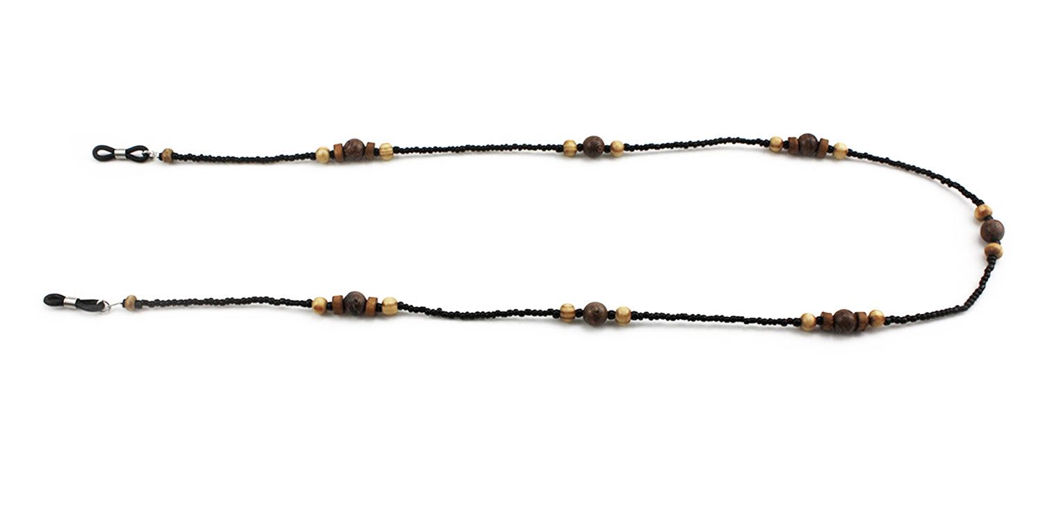 Brillenkette mit schwarzen Perlen und Holzperlen. Die Kette hat Schlaufen zum Befestigen an Brillenbügeln.