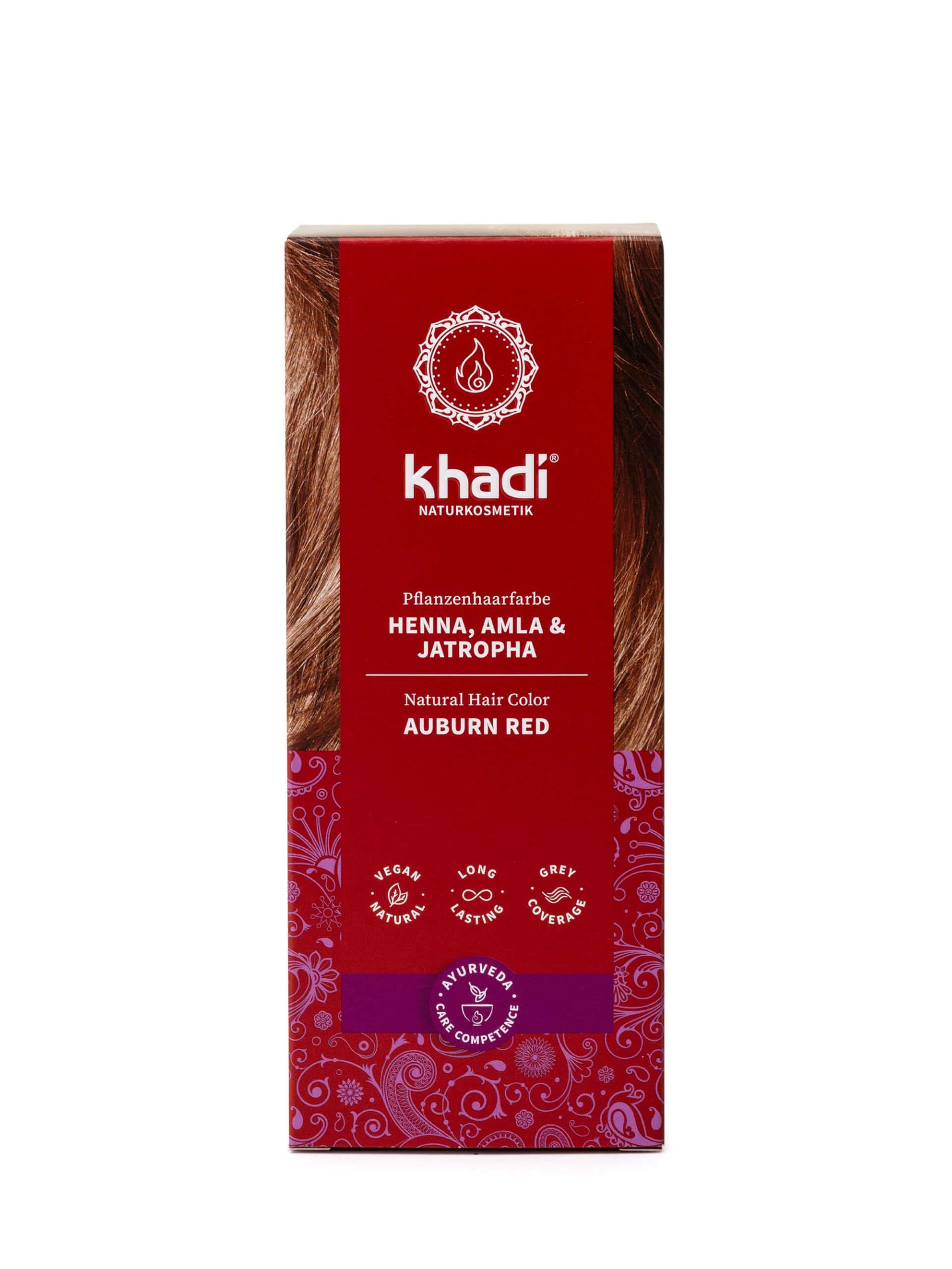 Rote Verpackung mit Produktnamen und Logo. Text: Pflanzenhaarfarbe, Henna, Amla & Jatropha, Auburn Red. Vegan, Long Lasting, Grey Coverage.