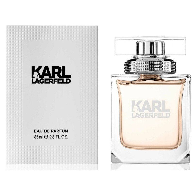 Transparente Flasche mit einem roten Mohn und einem grünen Stiel. "FLOWERBYKENZO" ist aufgedruckt.
