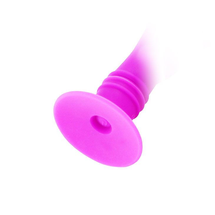 Nahaufnahme des Sockels eines pinkfarbenen Analplugs. Ein Loch ist in der Mitte des Sockels sichtbar.