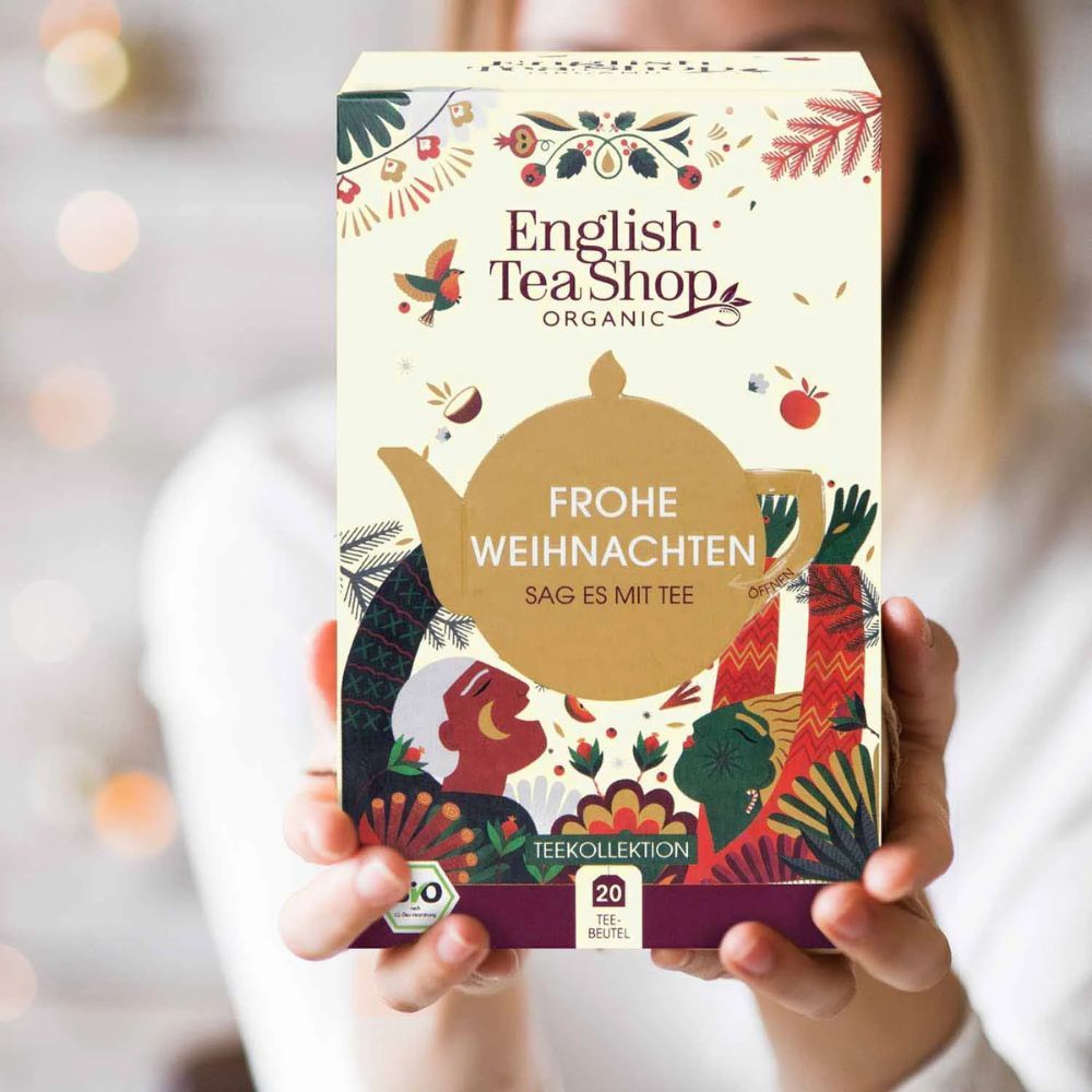Teegeschenkbox mit Aufschrift "Frohe Weihnachten". Enthält 20 Teebeutel. Bio-Zertifizierung. English Tea Shop Logo.