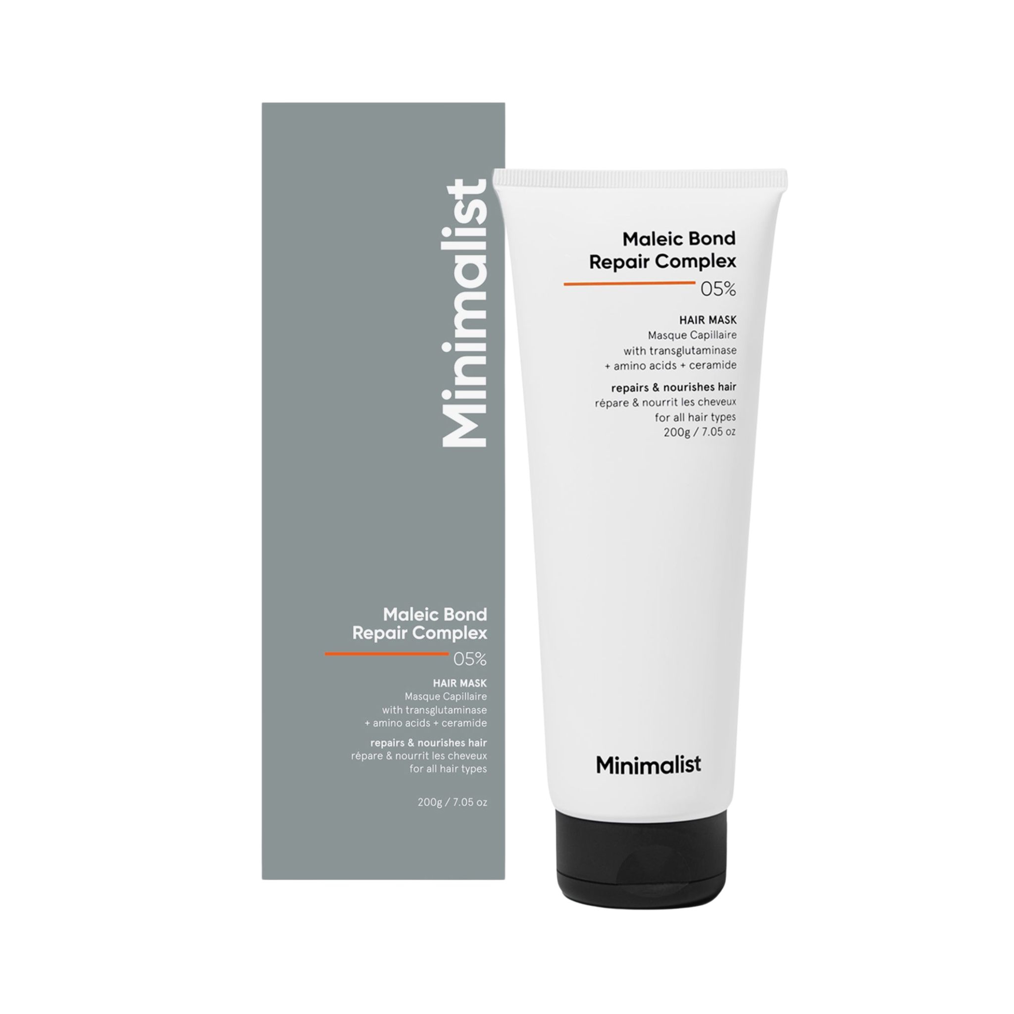 Haarmaske in Tube und Verpackung. Text: Maleic Bond Repair Complex 05%, Minimalist. Schwarzer Deckel, graue Verpackung.