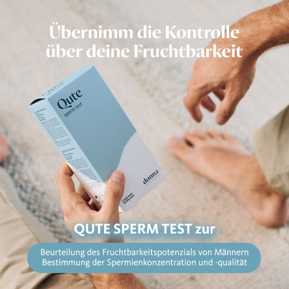 Hände halten Qute Sperm Test-Verpackung. Aufschrift "Qute sperm test" und "Donna". Text: QUTE SPERM TEST zur Beurteilung des Fruchtbarkeitspotenzials von Männern.