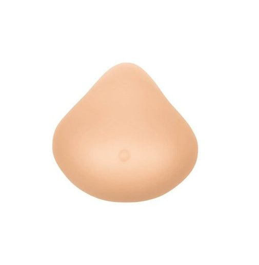 Brustprothese in Hautfarbe. Tropfenförmig, mit einer kleinen Erhebung. Glatte Oberfläche.