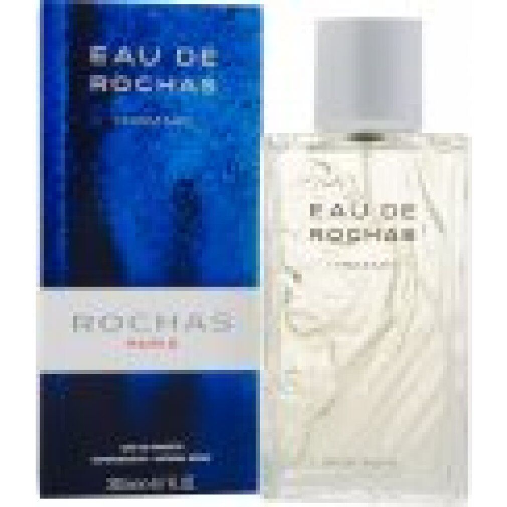 Eau de Rochas Homme Flakon und Verpackung. Rechteckiger Flakon mit silbernem Verschluss. Blaue Verpackung mit weißem Schriftzug.