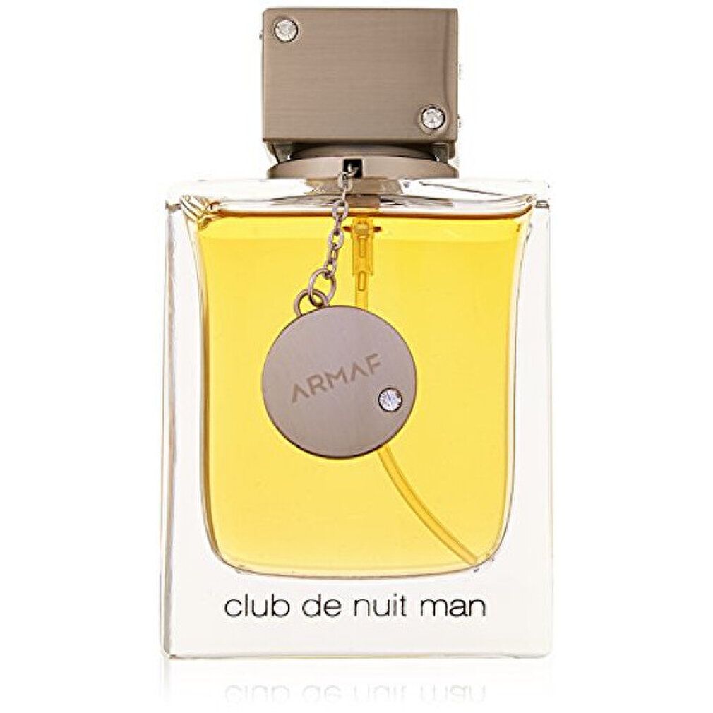 Quadratischer Flakon Eau de Toilette. Aufschrift: Club de Nuit Man. Metallkappe und Anhänger.