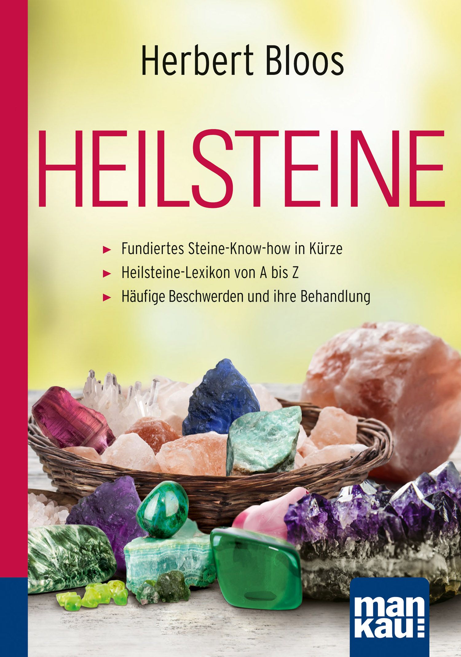Buchcover mit Titel "HEILSTEINE". Autor: Herbert Bloos. Auf dem Cover sind Edelsteine in einem Korb abgebildet. Verlag: mankau.