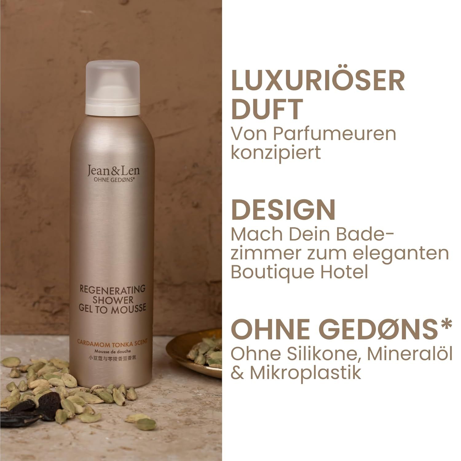 Beige Flasche mit weißem Pumpkopf. Aufschrift: Jean & Len, Regenerating Shower Gel to Mousse. Text und Kardamom-Kapseln.