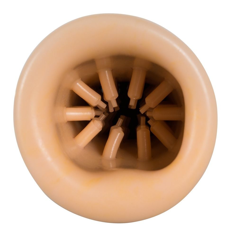 Masturbator-Innenseite. Beige mit Noppen. Geformte Oberfläche mit kleinen Erhebungen.