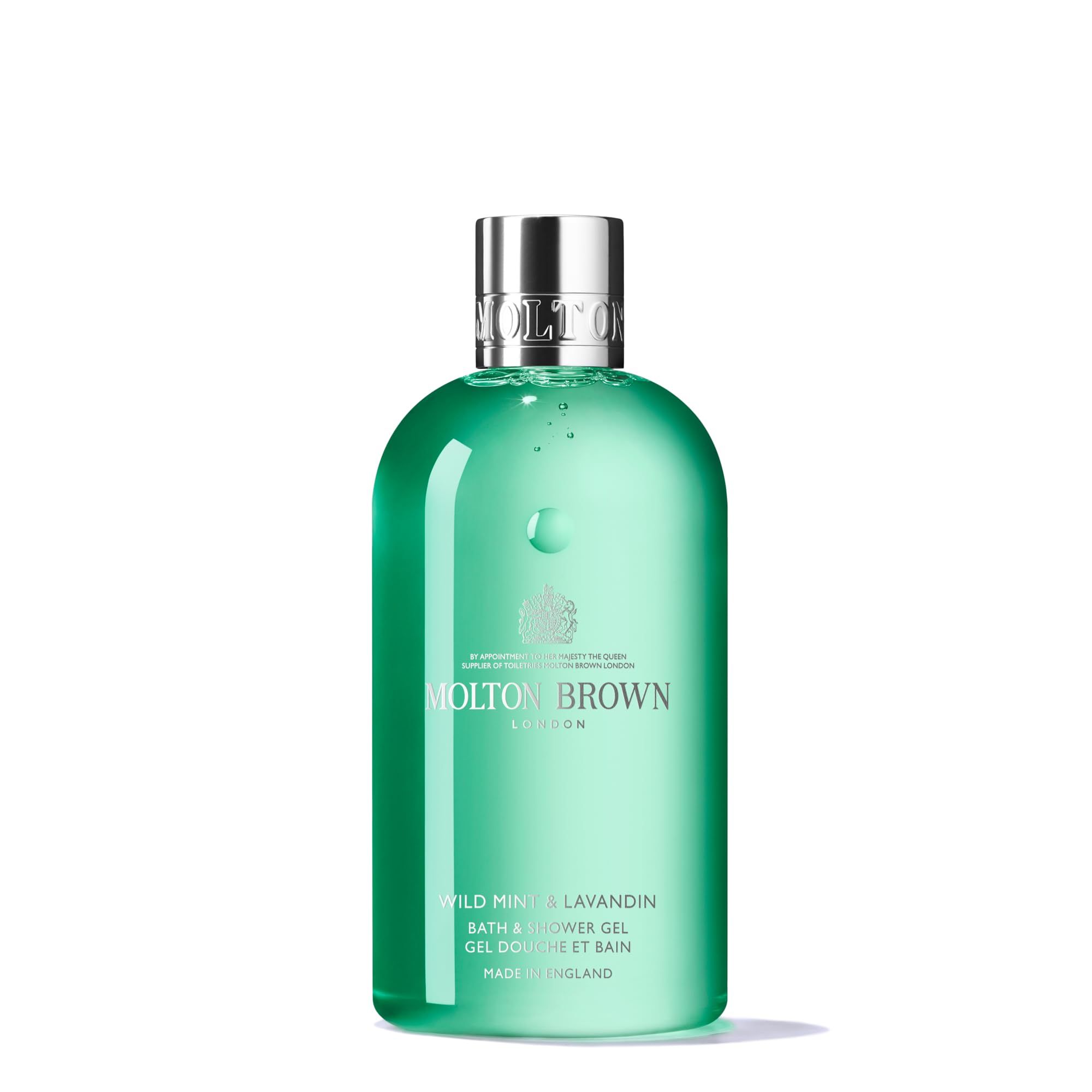 Grüne Flasche Molton Brown Wild Mint & Lavandin Bade- & Duschgel mit silbernem Verschluss.