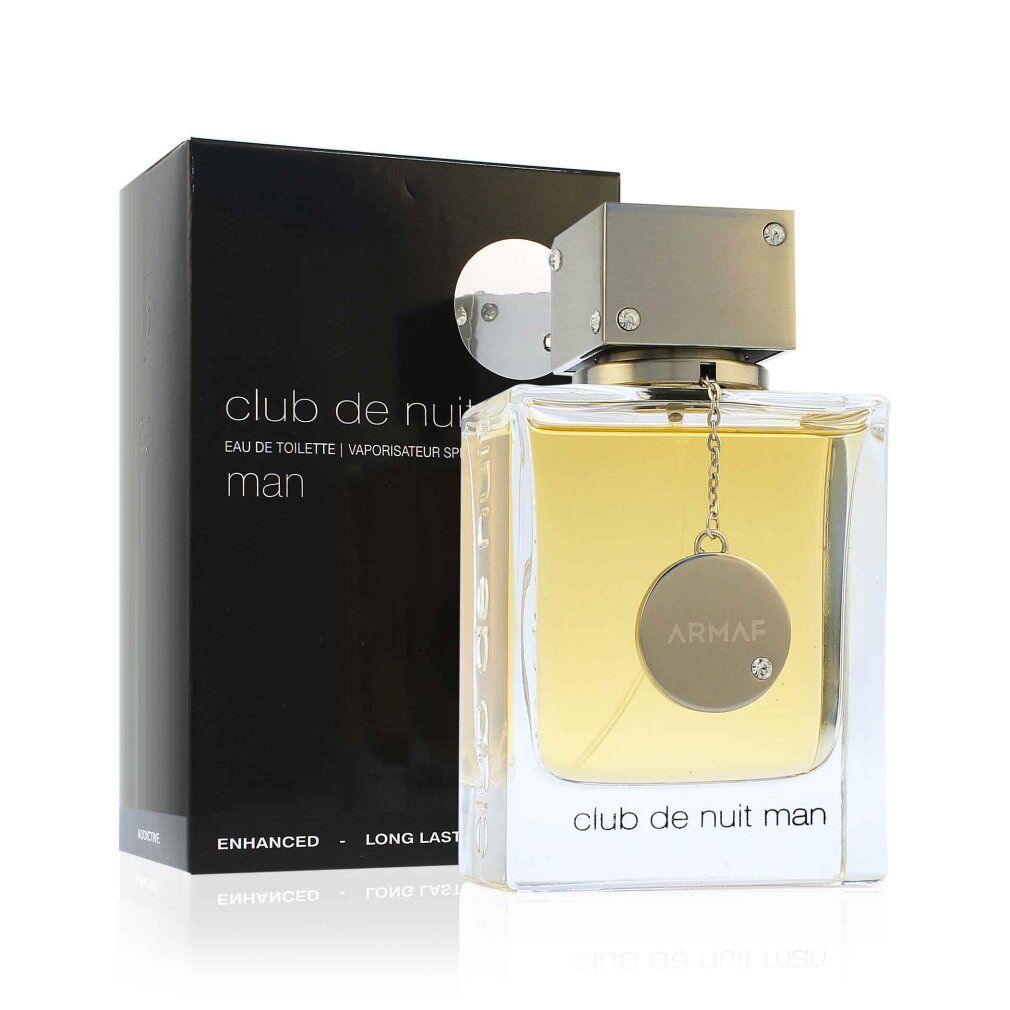 Club de Nuit Man Flakon und Verpackung. Schwarze Verpackung mit weißem Kreis. Flakon mit silberner Kappe und Anhänger.